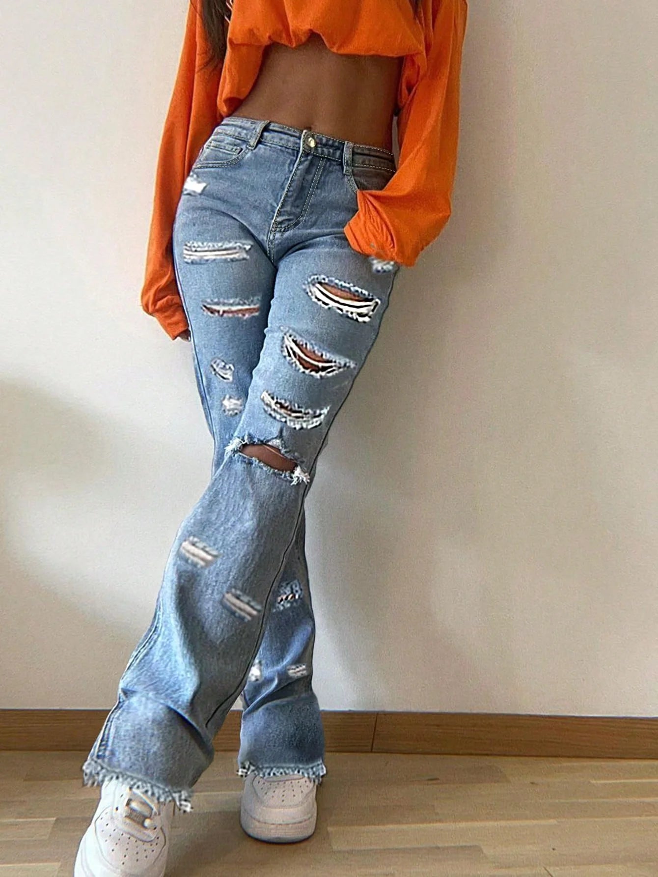 Street trend women's heart back pocket ripped slim-fit jeans